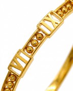 916 Gold Bangle Roman Bead